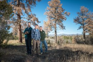 Tree physiologist Nate McDowell, center, climatologist Park Williams, left, and ecologist Craig Allen, right, are studying how trees die to help predict how forests will fare in a hotter future.